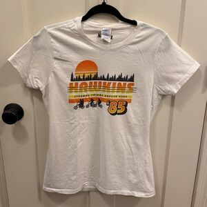 Netflix White Short Sleeve Tee with Orange & Yellow 'Hawkins 85' Graphic